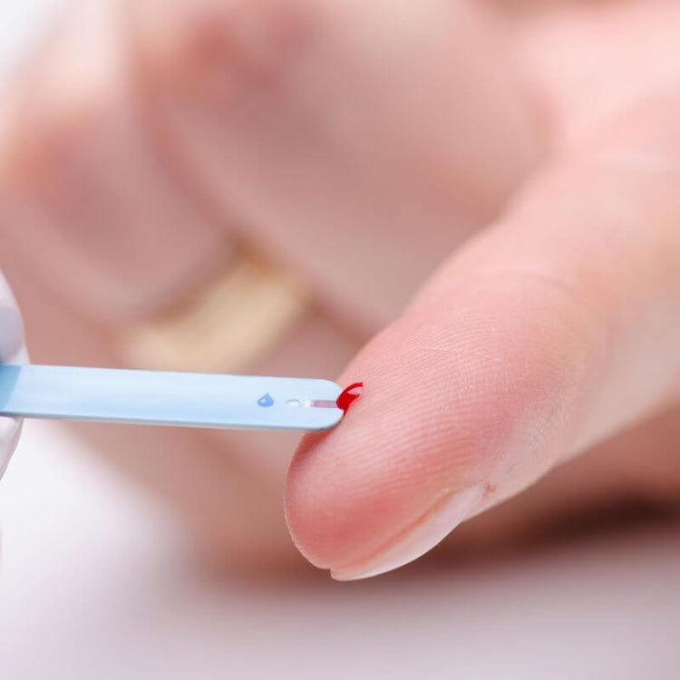 Senior using non-invasive glucose patches for blood sugar monitoring