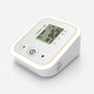 KWL-B04 digital blood pressure monitor side view showing compact design for elderly home use